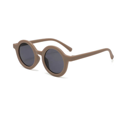 Kids fashion sunglasses with a round shape frame, matte finish in chocolate brown